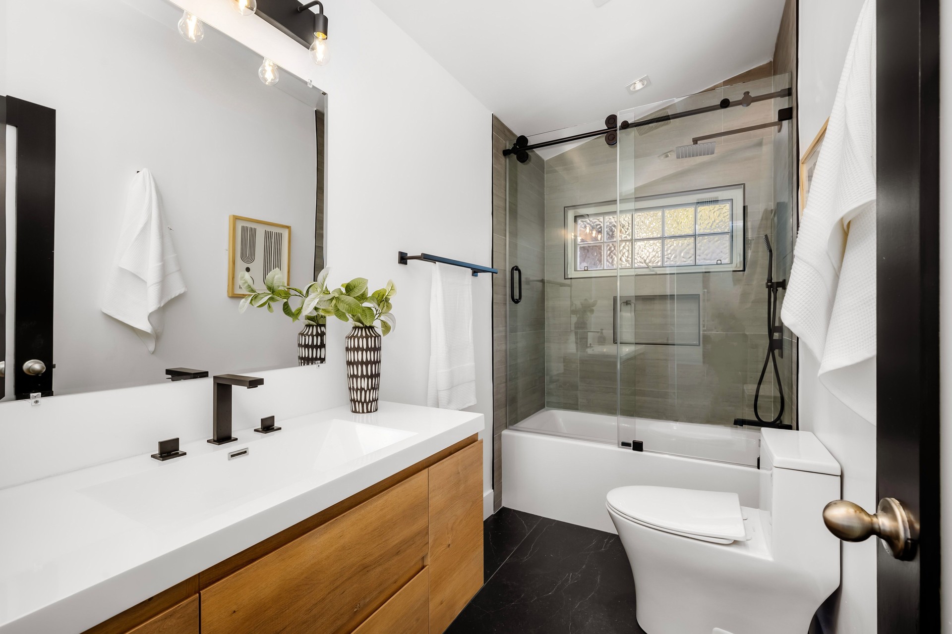 Modern Hollywood Hills home bathroom in Los Angeles, California, with a remodel of an older house